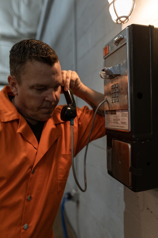 incarcerated man calling bondsman from jail