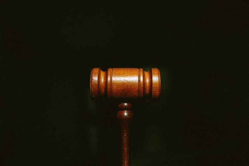 Wooden Gavel Against Black Background