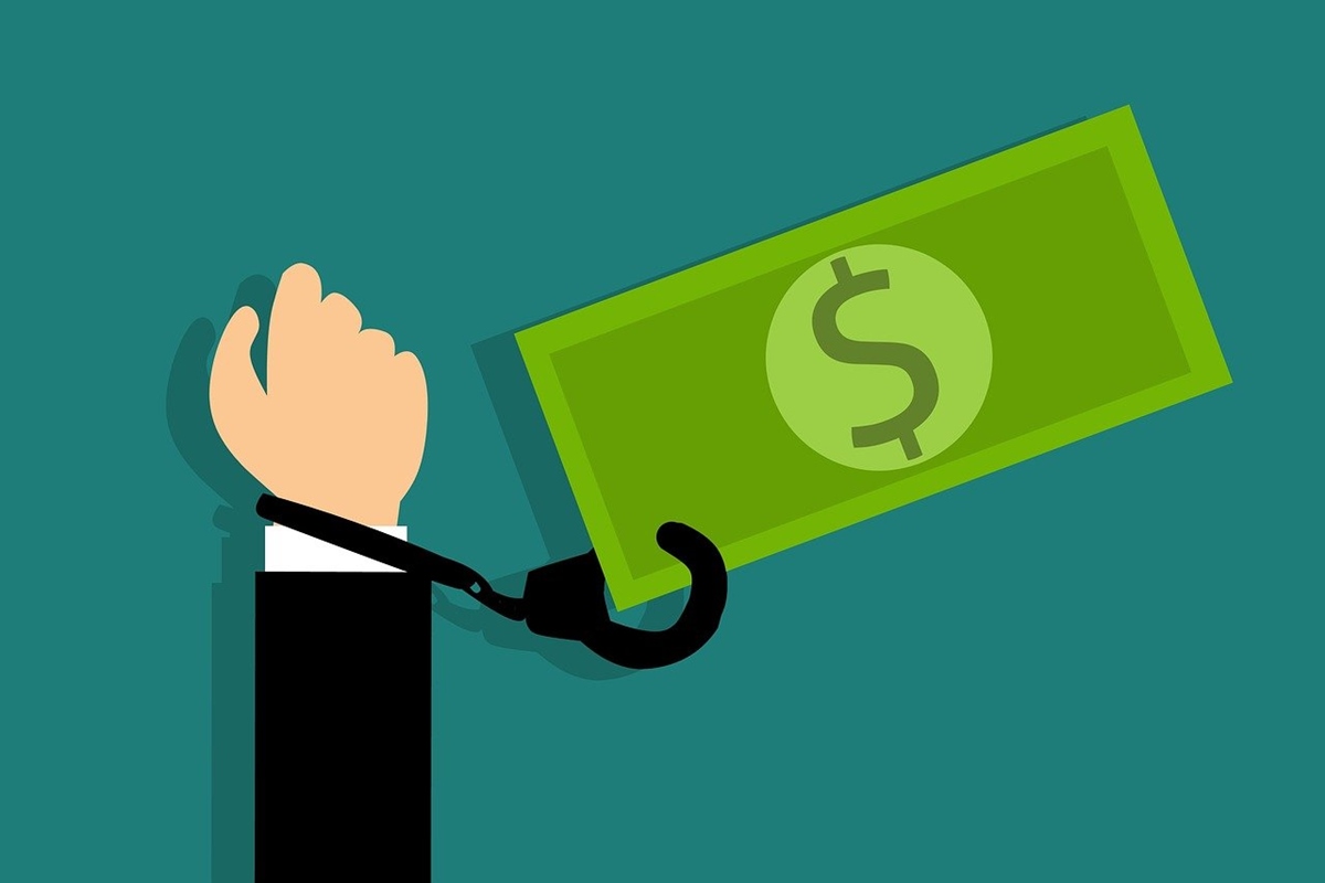 Animated arm handcuffed to large dollar bill