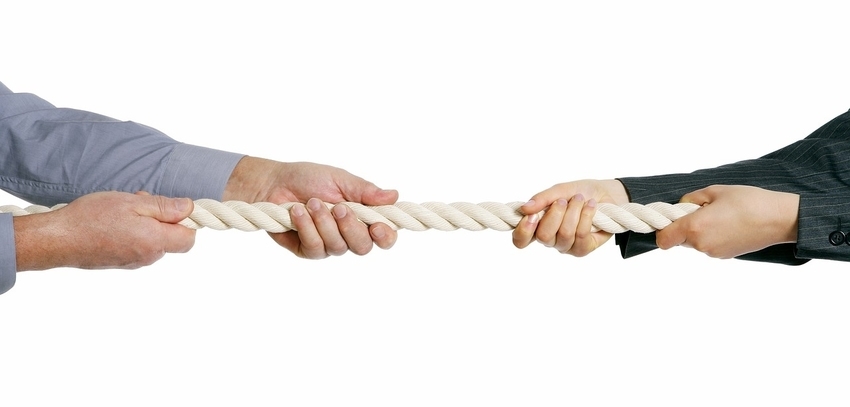 Hands Pulling Rope from Opposite Sides in Game of Tug-of-War